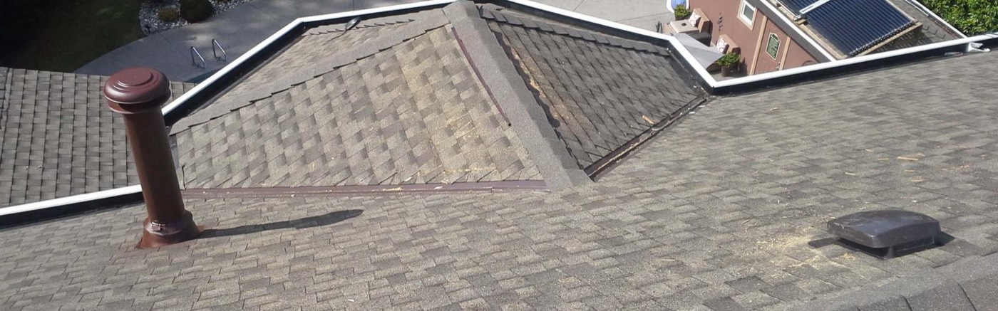 Dark tile roof and gutters